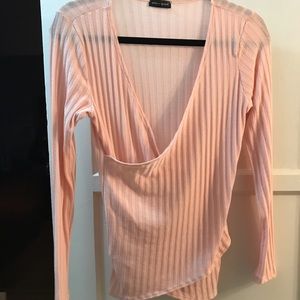 Faux-wrap pink knit sweater
